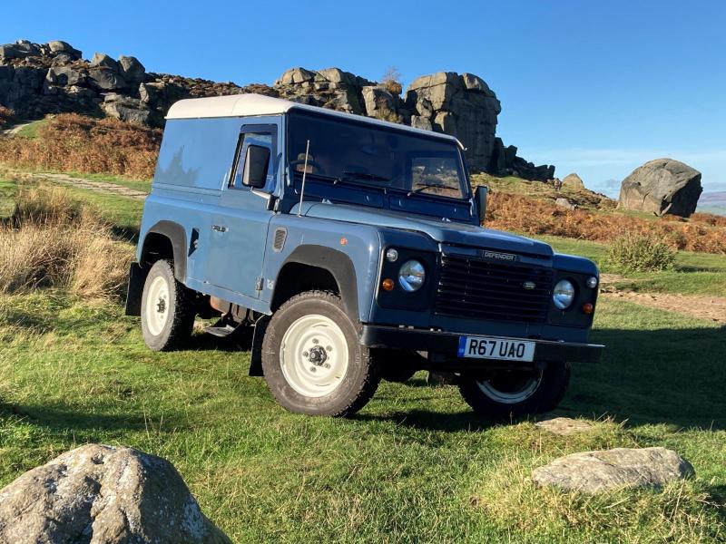 Land rover defender is seen here on Ilkley Moor near the Cow and Calf Rocks