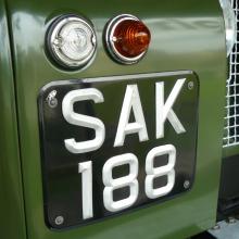 land rover number plate now fitted alongside the original glas side lamps