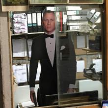 A James Bond lookalike is in our office window