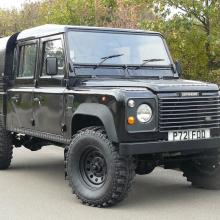A black painted refurbished 130 crew cab Land Rover