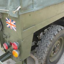 The rear panel of the land rover lightweight has the union flag on it.