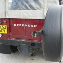 The spare wheel of the Land rover double cab pickup is shown her on a swing away wheel carrier 