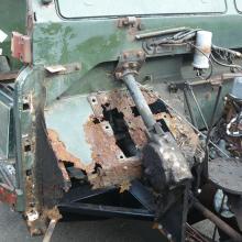 land rover series 3 footwell showing the rust after removing the pedals