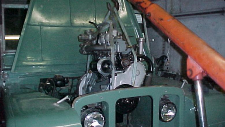 series one engine being fitted into an 80" land rover