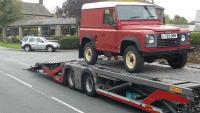 Here is a picture of a land rover Defender on the transporter ready for USA Export